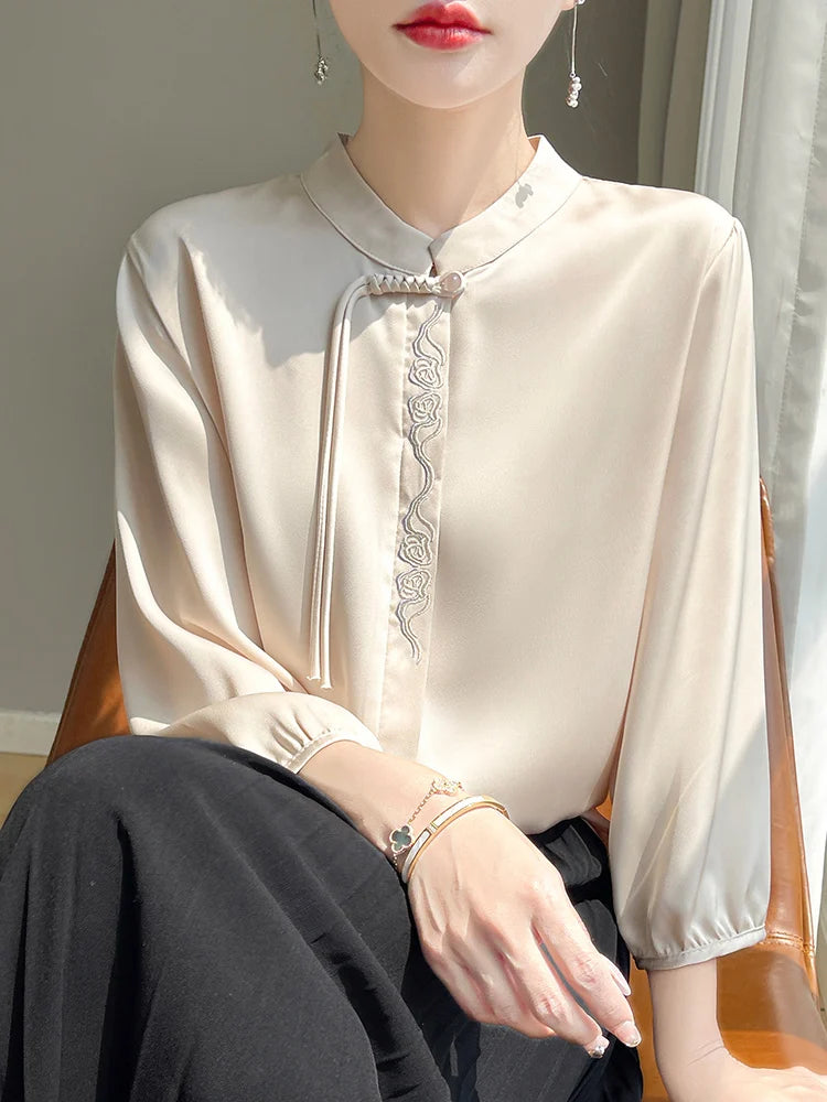 Blusa estiva elegante in seta topazio scintillante