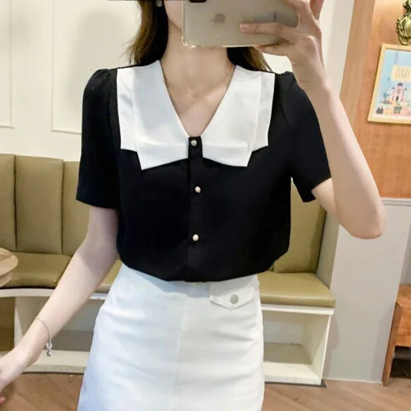 Blusa estiva nera in chiffon di DroomDames