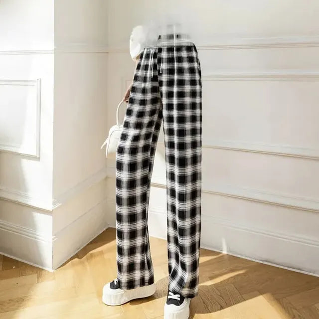 Pantaloni a zampa d'elefante a vita alta a righe monocromatiche in stile Luna