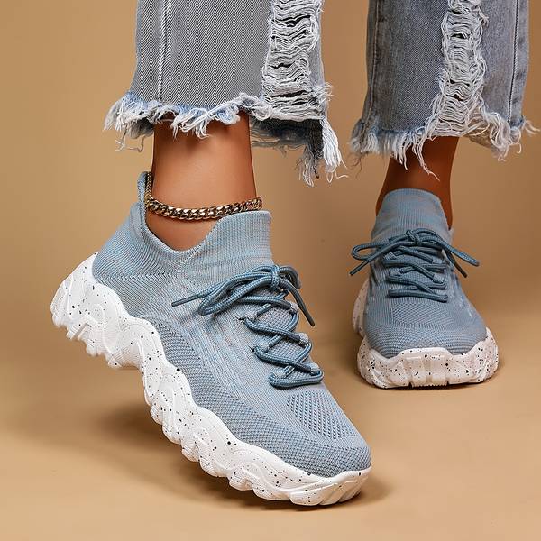 Hellblaue elastische Socken-Schuhe